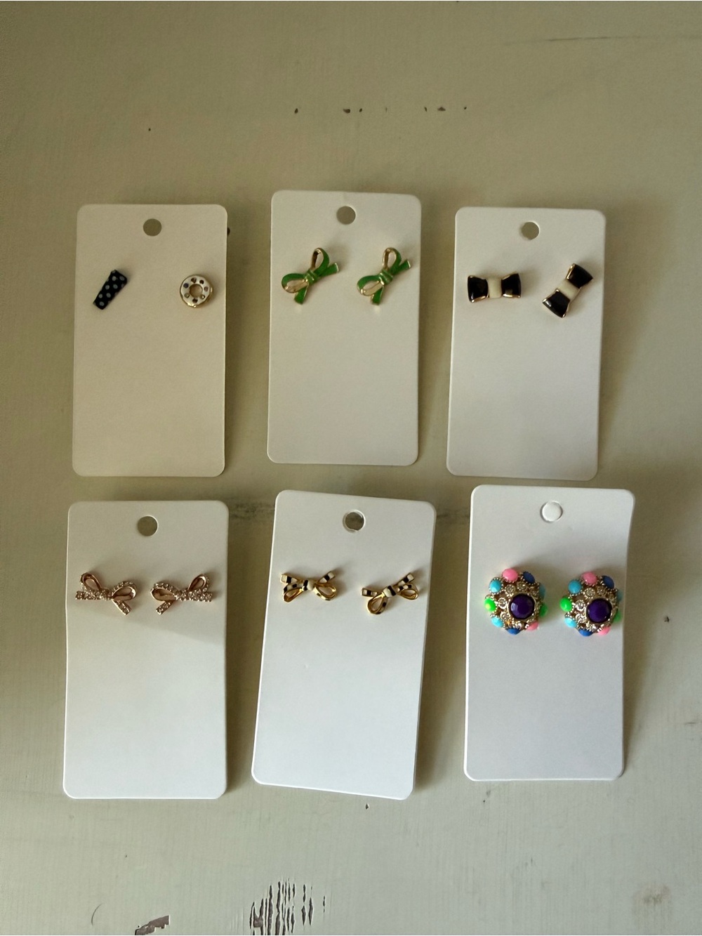 75 pairs of earrings • Kate Spade, Prep obsessed and Caroline Hill